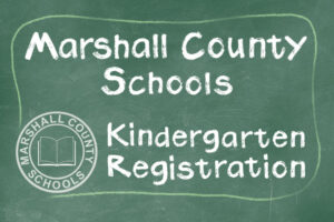 Green chalkboard with Marshall County Schools Kindergarten Registration written in white chalk