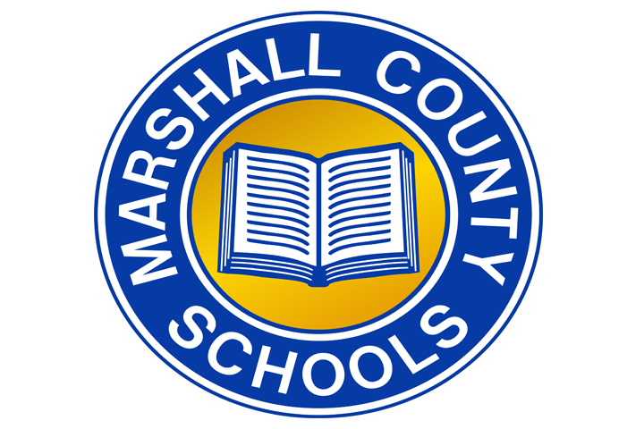 Marshall County Schools written in white over top of a blue background with a white book over top a yellow background. The logo is circular.