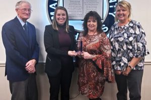 Pictured from left: Marshall County Schools BOE President John Miller, Alicia Cunningham, Senior Safety & Loss Control Consultant for Encova Insurance, Beth Phillips, professional accountant for Marshall County Schools, and Marshall County Schools Chief Financial Officer Nan Hartley.