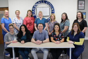 Pictured are 11 of the 12 school nurses who are employed by Marshall County Schools. Front row from left: Christina Robinson, Dawn Adkins, Marshall County Schools Student Services Director Casey Storm, Tammy Riding and Kelly Smith. Back row from left: Melissa O’Donnell, Denise Cramer, Christine Thames, Shellie Faulstick, Andrea Varner, Shelley Lilley and Jennifer Crow. Not pictured: Callie Earliwine.