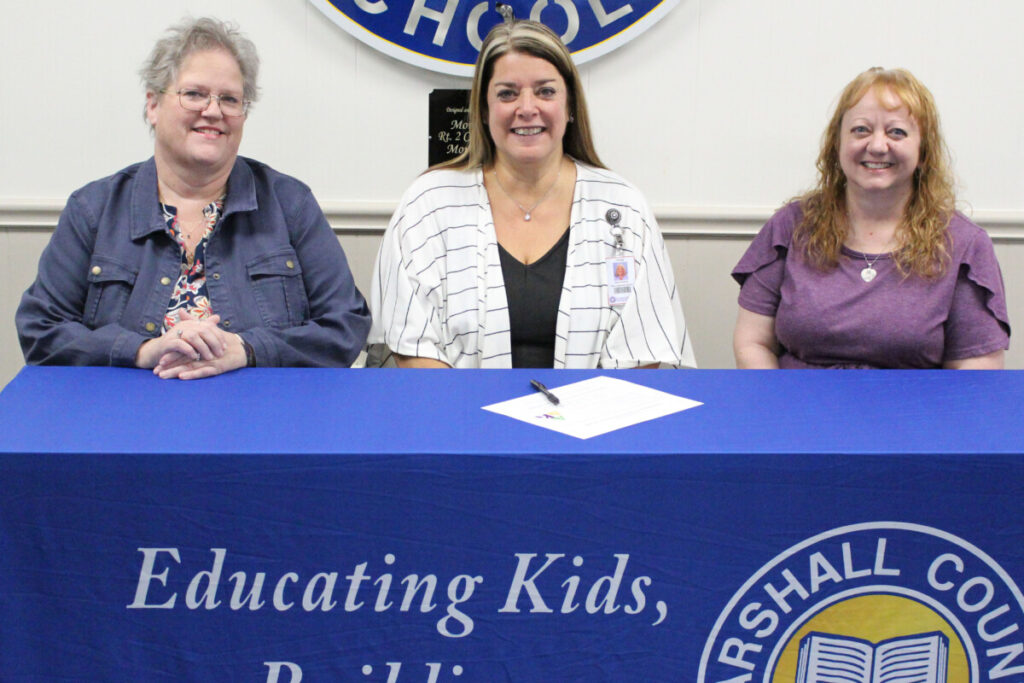 Pictured from left: ADK member Holly Woods, MCS Assistant Superintendent Karen Klamut and ADK member Jeannie Blake.